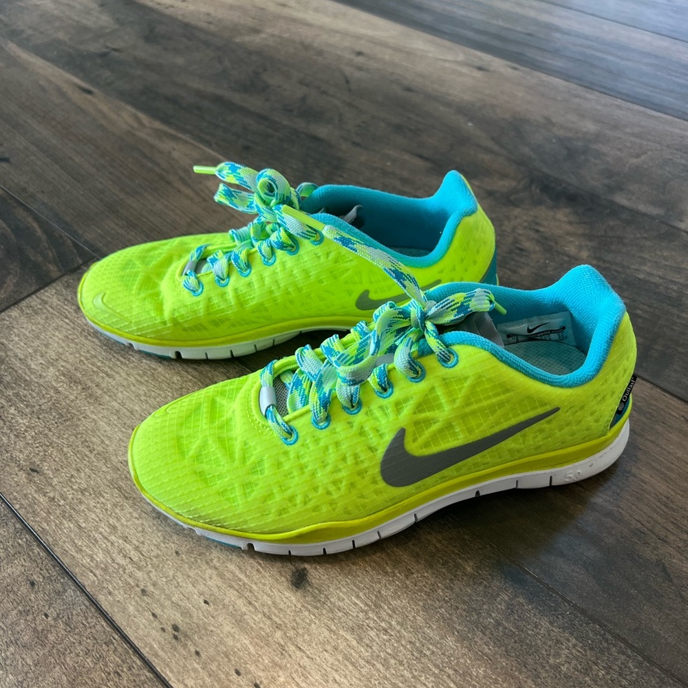 Nike Free 5.0 running shoes.